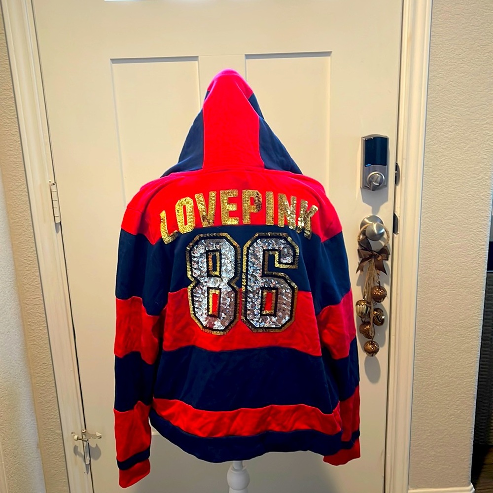 Pink Victoria’s Secret zip up hoodie with sequence back
